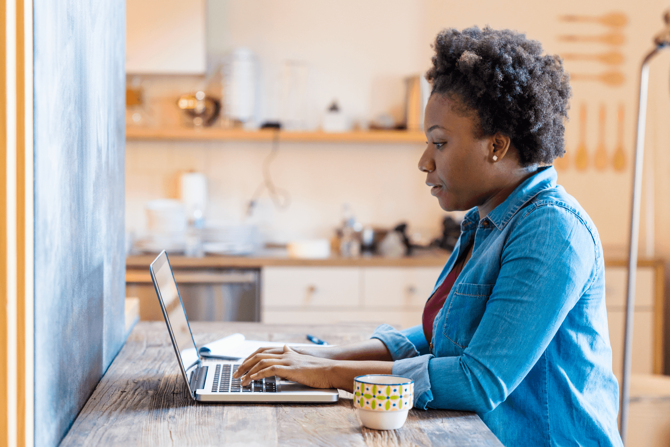 woman typing on a computer