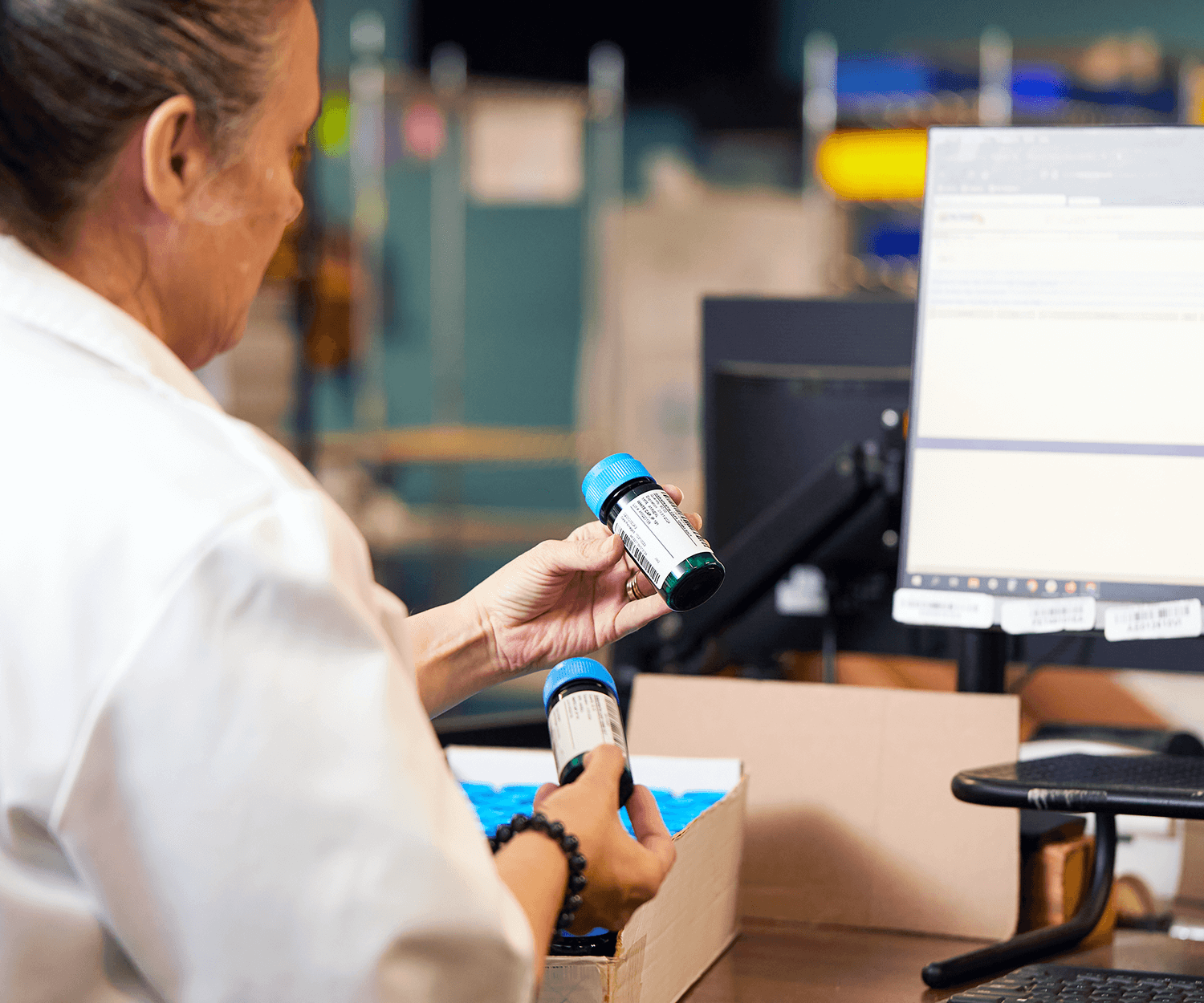 Pharmacists holding medication